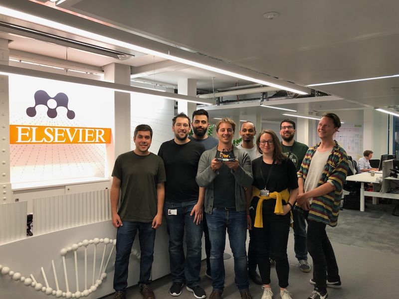 Mendeley team celebrating with failure award at Elsevier